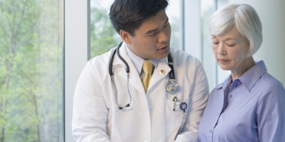 doctor speaking to a patient