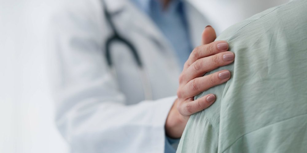 palliative care team consoling family care giver