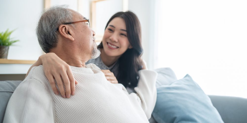 woman caring for a family member receiving palliative care
